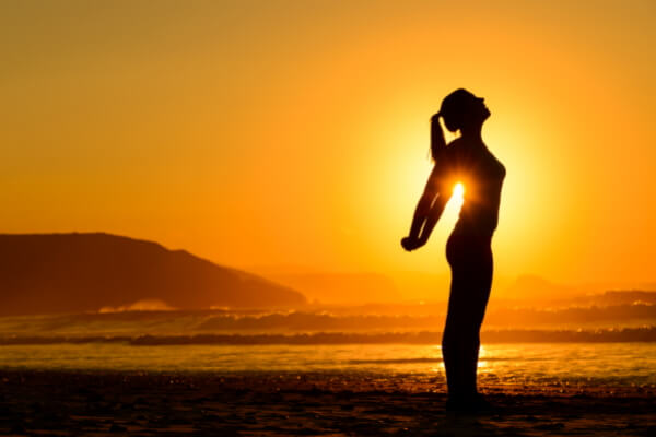 woman before a lovely sunset